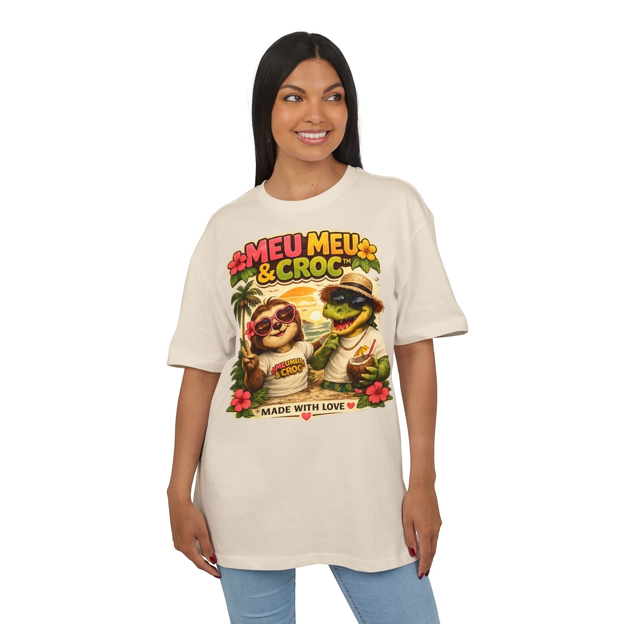 Model wearing a cream Meu Meu & Croc Tropical Store oversized cotton graphic tee with sloth and crocodile print.