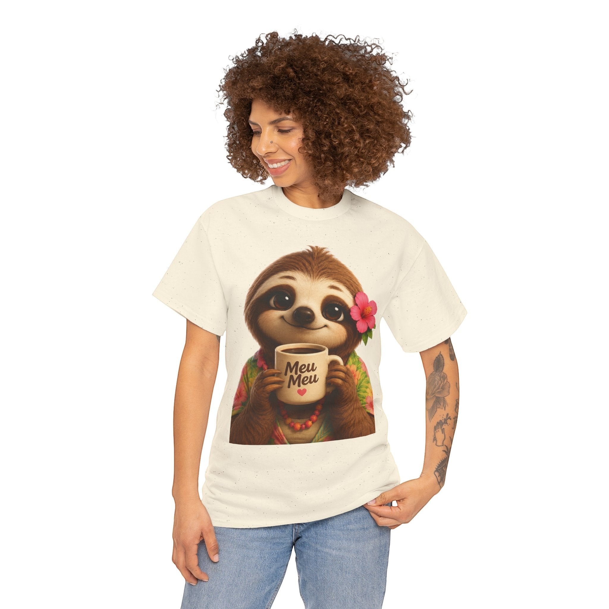 Woman wearing a Meu Meu & Croc Tropical Store cream cotton t-shirt with a cute sloth holding a coffee mug graphic.