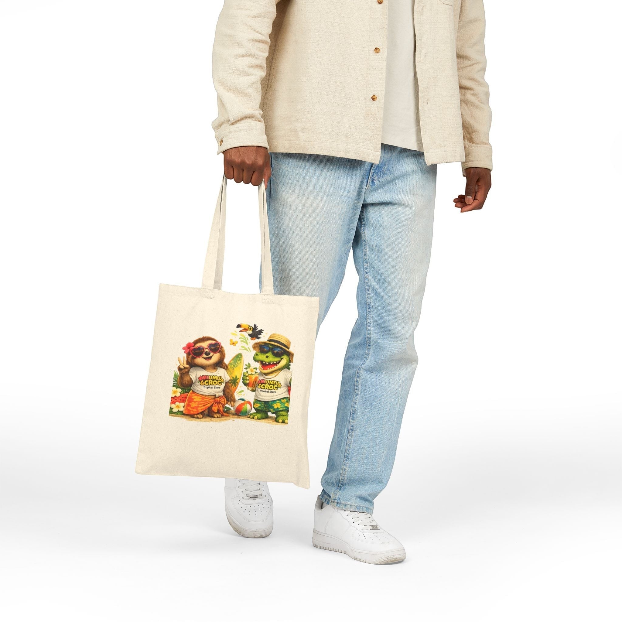 Meu Meu & Croc Tropical Store natural canvas tote bag with sloth and crocodile beach vacation graphic print.
