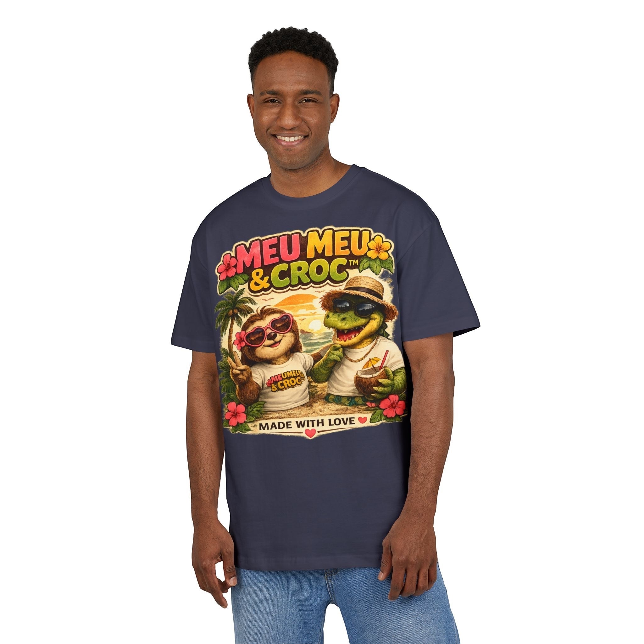 Man wearing a navy Meu Meu & Croc Tropical Store oversized cotton graphic tee with a sloth and crocodile print.